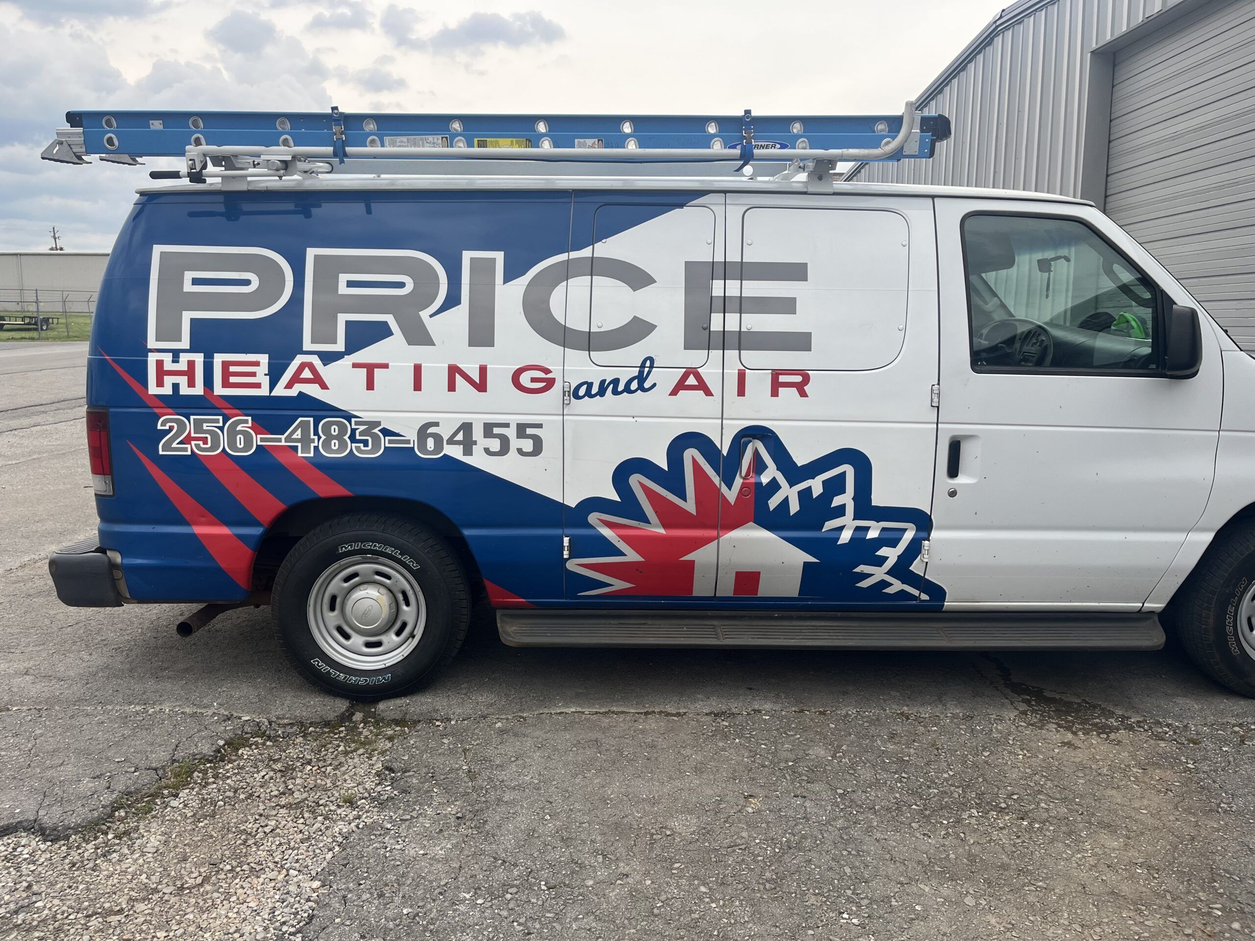 An image of a vehicle with the branding "Price Heating & Air Conditioning", a company offering HVAC supply in Muscle Shoals AL